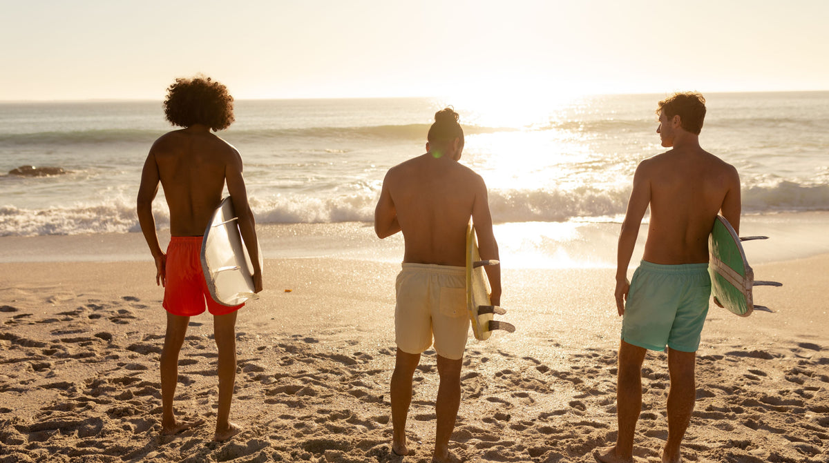 Young men in summer in the beach